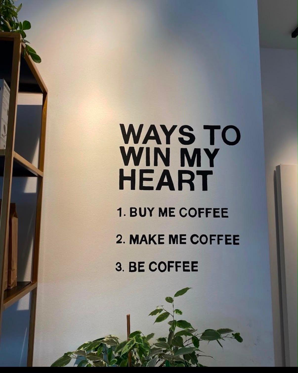 Muurtekst: ways to win my heart — buy me coffee